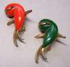 Pair of Orange & Green Figural Dolphin Pins
