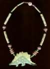 Ruby Z / Candace Loheed Dinosaur Necklace