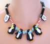 FLYING COLORS Ceramic Penguins Necklace