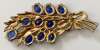 Gilt Potmetal Floral Spray Brooch w/ Blue Glass Stones