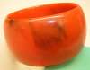 Wide Orange & Black Swirl Plastic Bangle