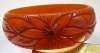 Bakelite Pumpkin Bangle - Carved Floral Design